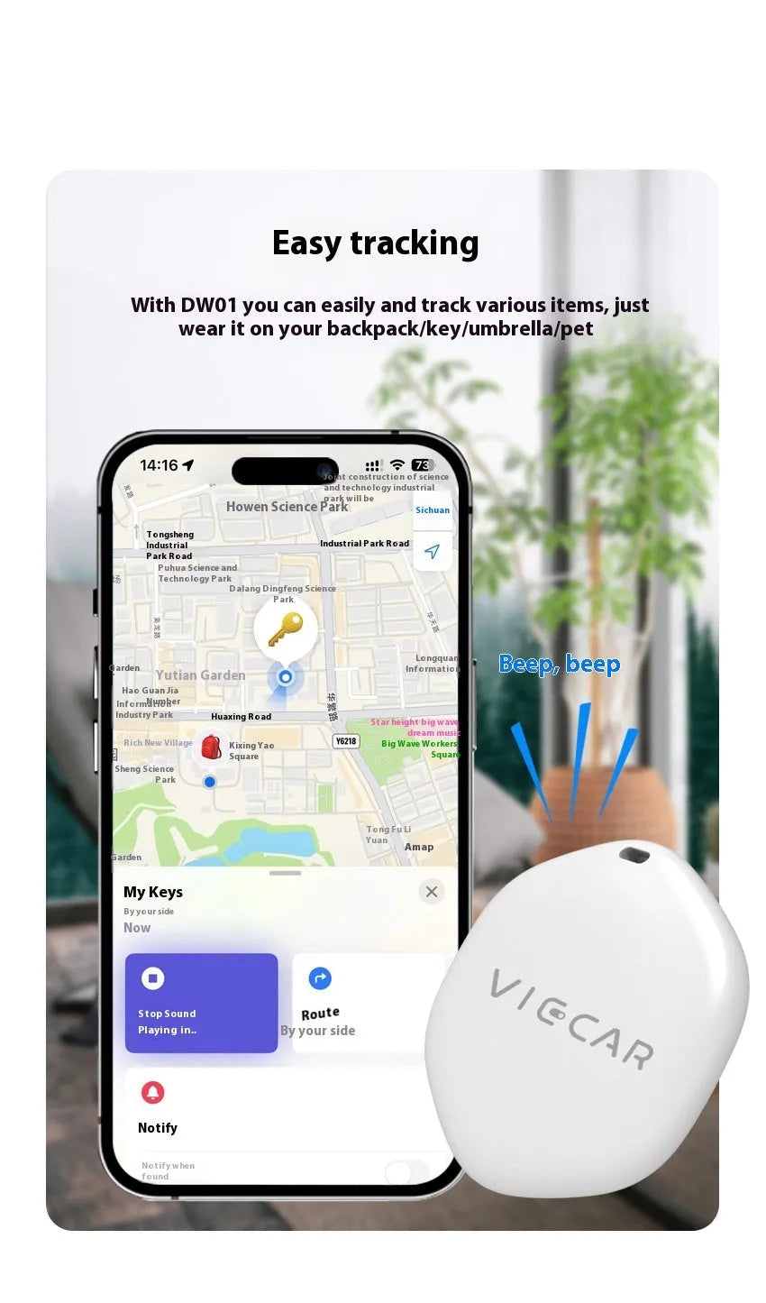 White ITag smart anti-lost tracker on a table with a keyring, showing Bluetooth 5.1 compatibility for Apple devices