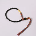 Obsidian coloured hand-woven carrying strap bracelet with 4mm width.