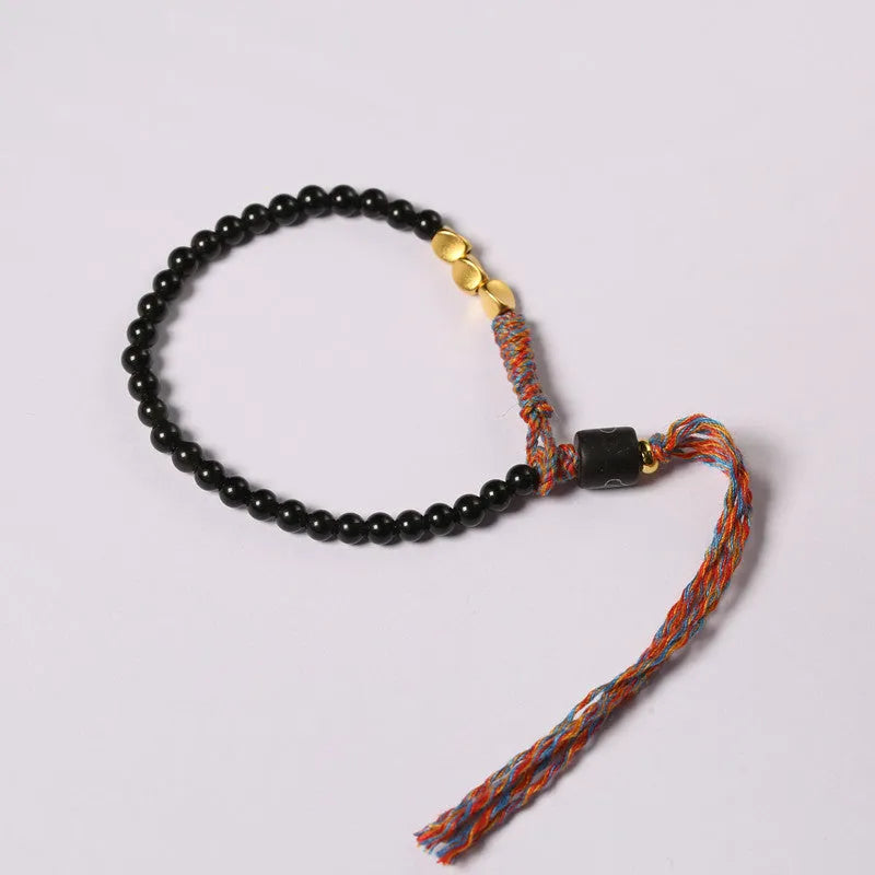 Obsidian coloured hand-woven carrying strap bracelet with 4mm width.