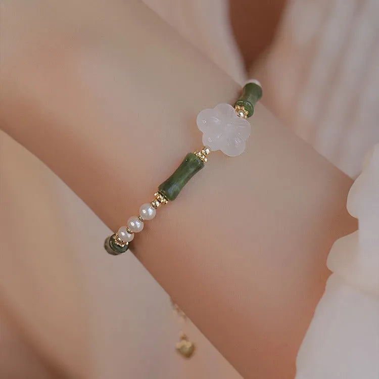 Chinese style bamboo joint bracelet with shell pearls, Hetian jade, and copper connectors
