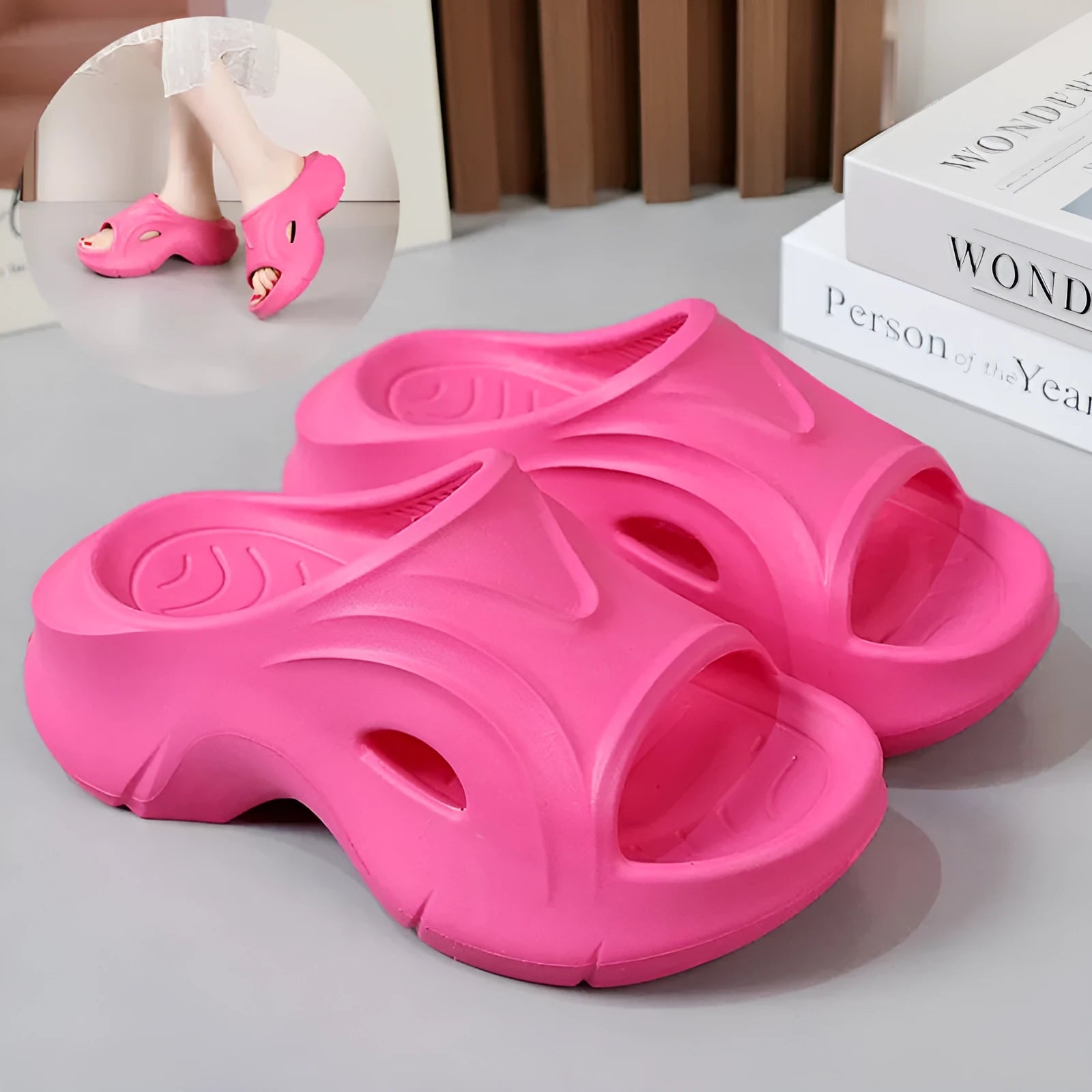 Women's white thick-sole EVA beach slippers with a round toe, shown on a sandy background.