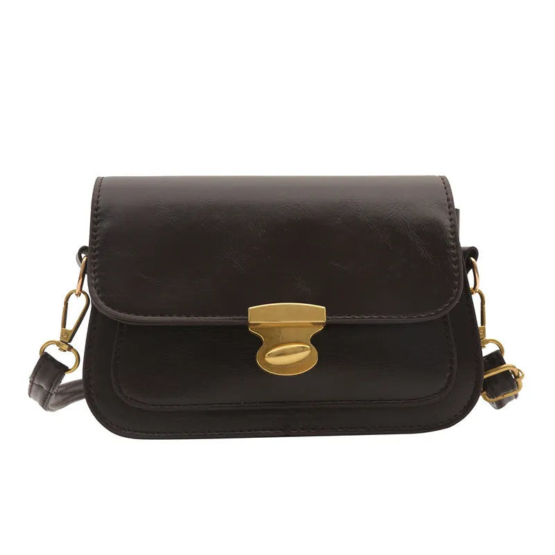 Soft PU leather retro small square handbag in black, brown, dark brown, or light brown.