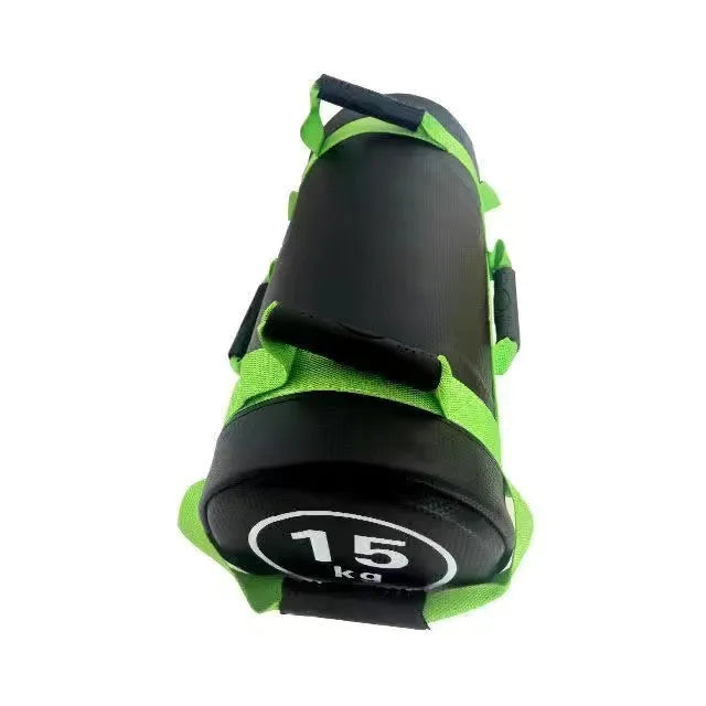 A flat white PVC power lifting sandbag for weight training on a gym floor.
