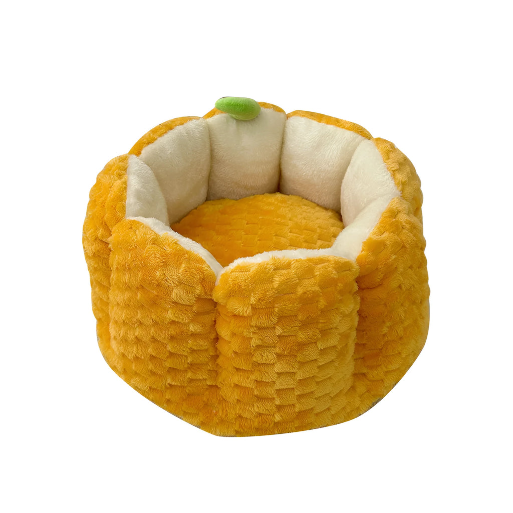 Pumpkin-shaped pet nest with raised sides and cotton filling for cats and small dogs