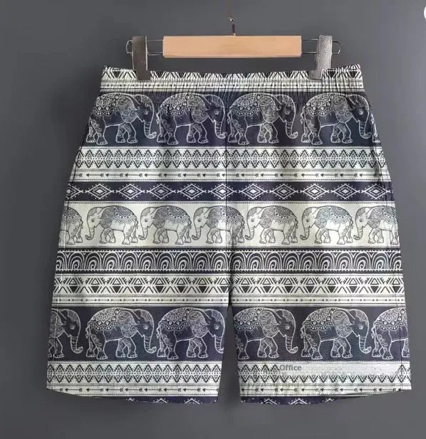 Men's casual polyester shorts in a camouflage pattern, featuring an elastic waistband.