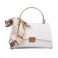 PU leather crossbody bag in solid colour with crocodile pattern and sewing line, 25x15x9.5cm size, white background