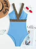 Women's deep V neckline one-piece swimsuit with spaghetti straps in polyester fabric