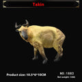 Plastic simulation animal toy model of a takin, 10.5cm tall, in natural colour finish, on a white background