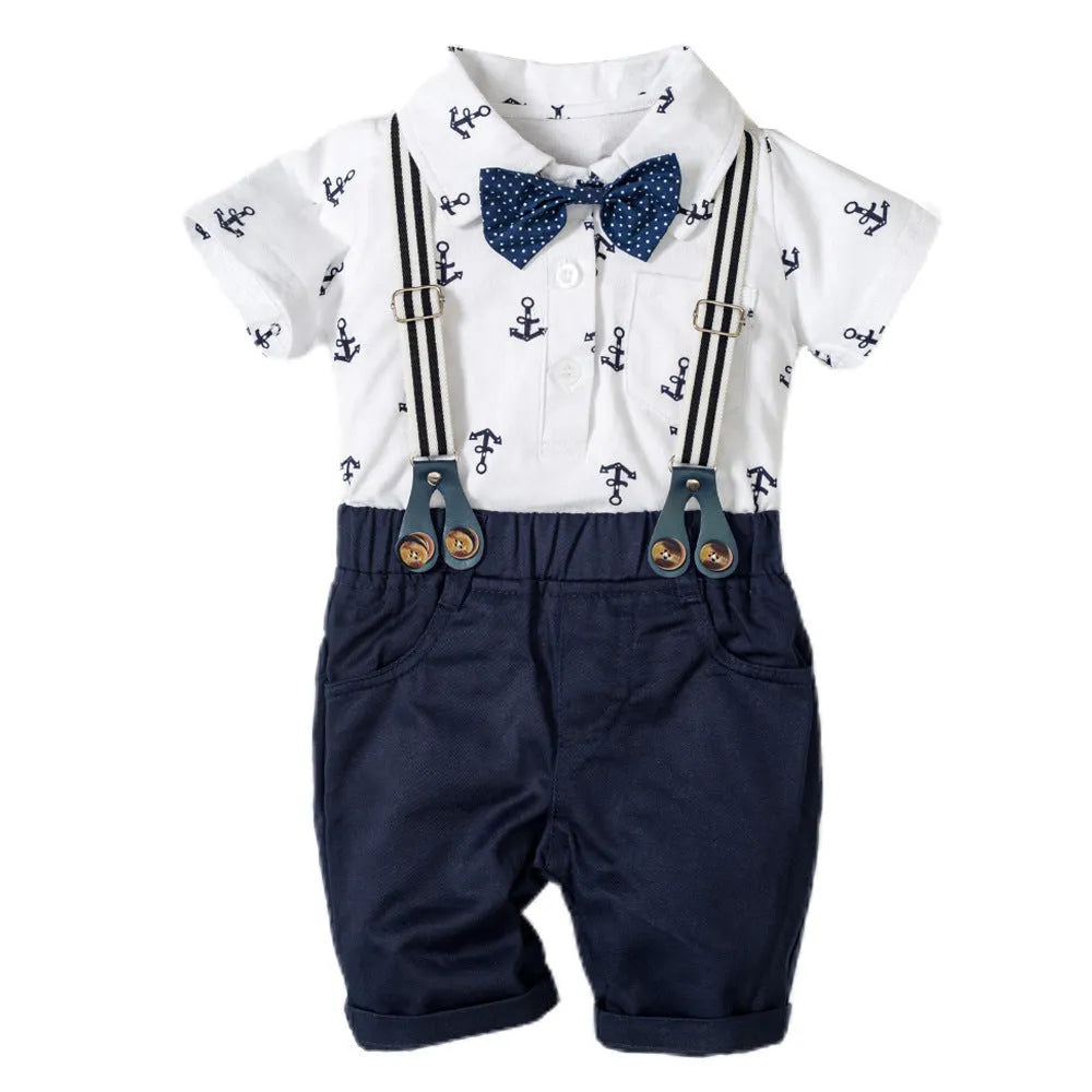 Blue and white cotton baby boy gentleman romper with triangle climbing print and short sleeves.
