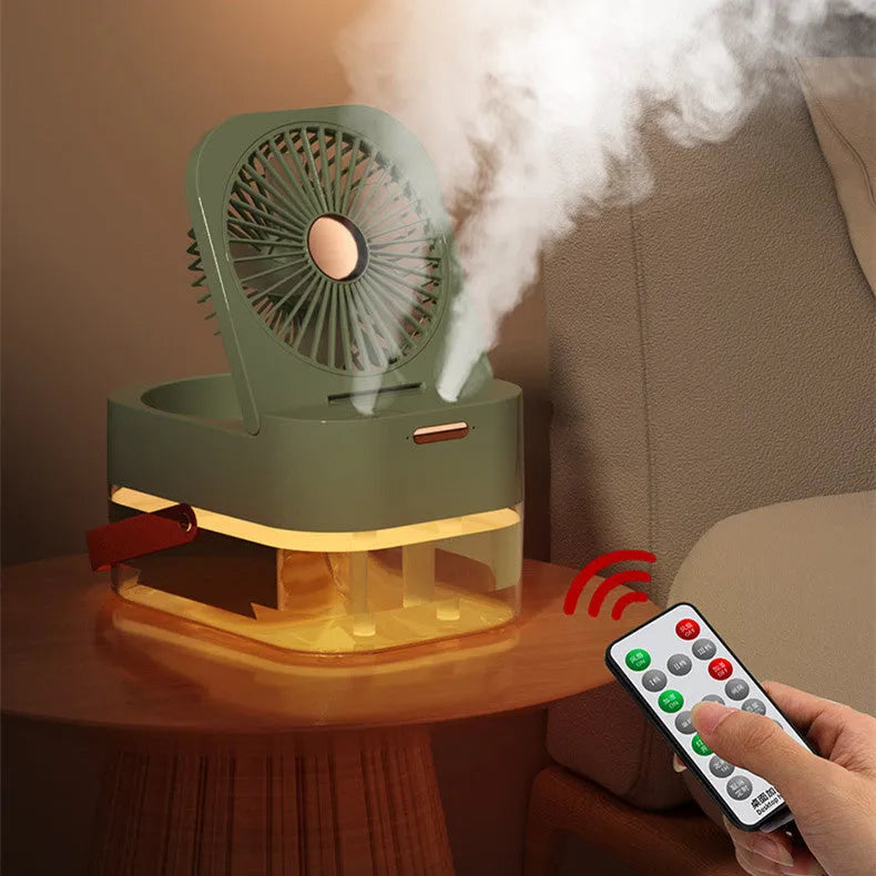 Portable pearl white USB desktop humidifier fan with remote control on a wooden desk.