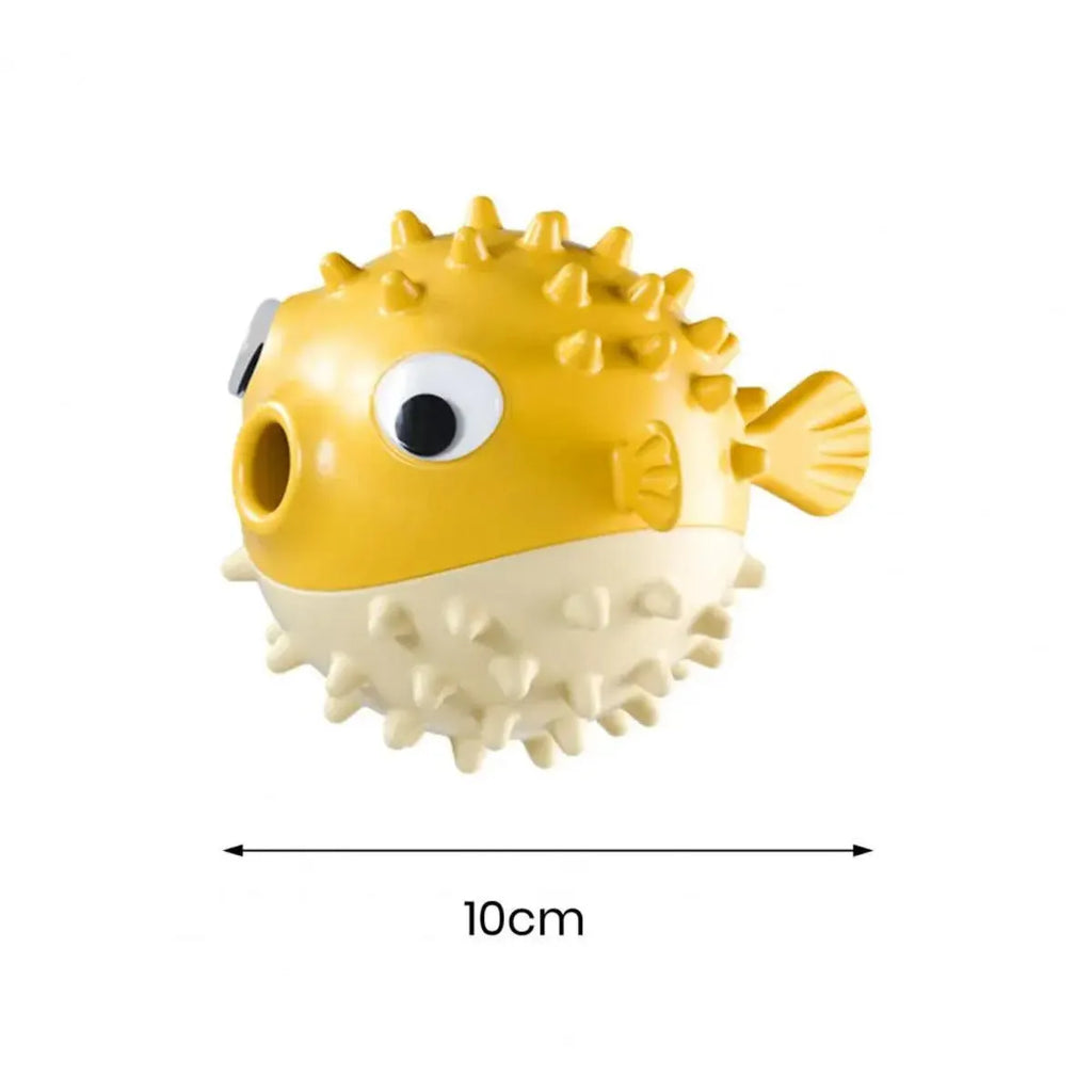 Yellow durable fish-shaped vinyl dog chew toy with textured surface and squeaker.