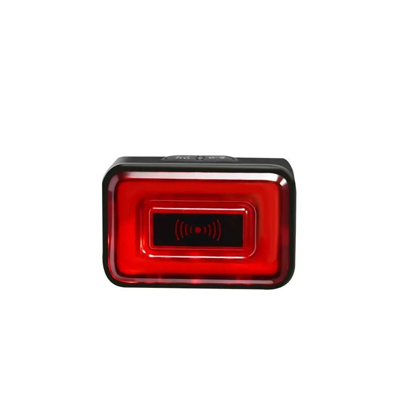 Black radar detection bicycle safety taillight with dual plastic mounting brackets.