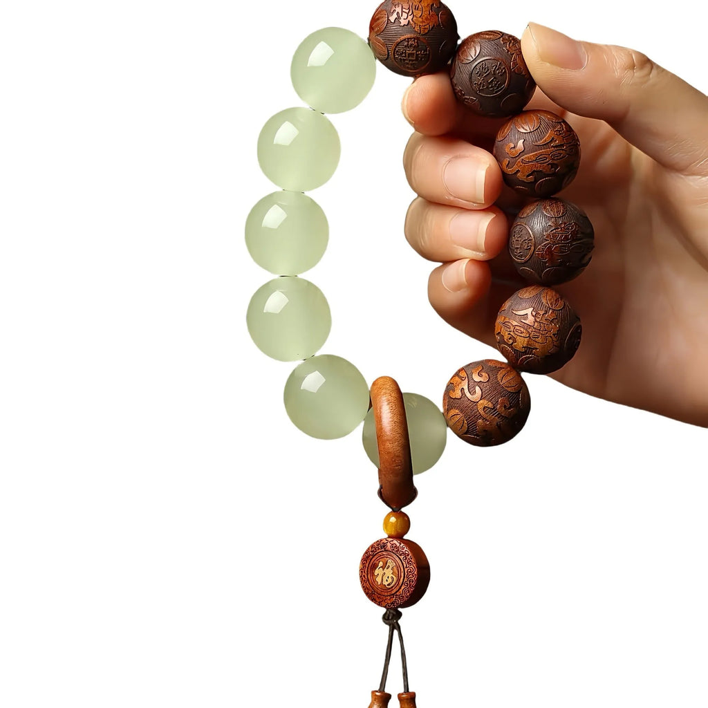 Wooden amass fortunes bracelet with carved Fu character design on rosewood