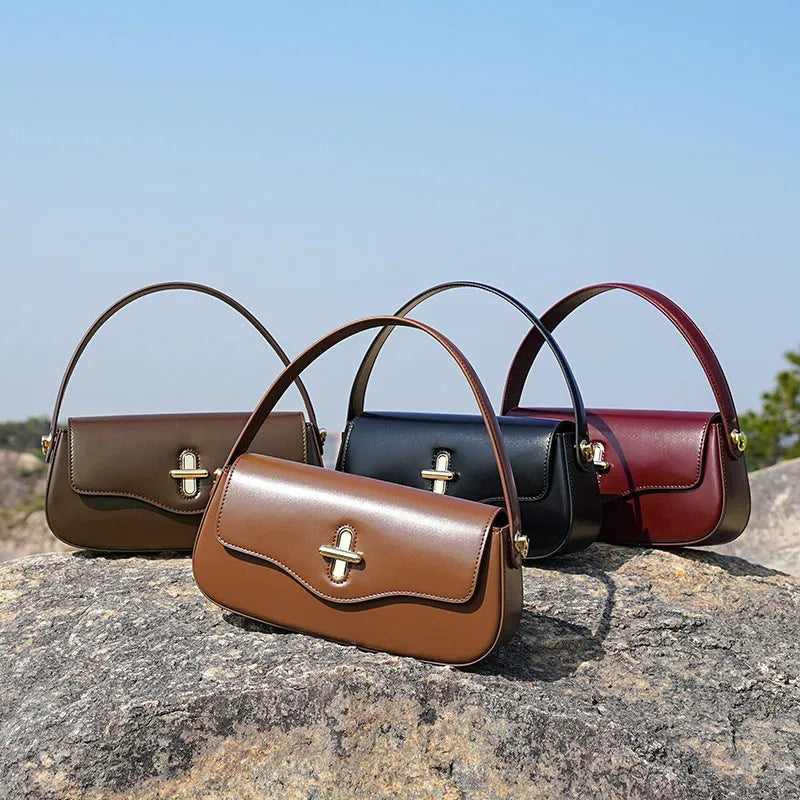 Leather baguette shoulder bag in black, wine red, coffee or caramel with organised interior compartments