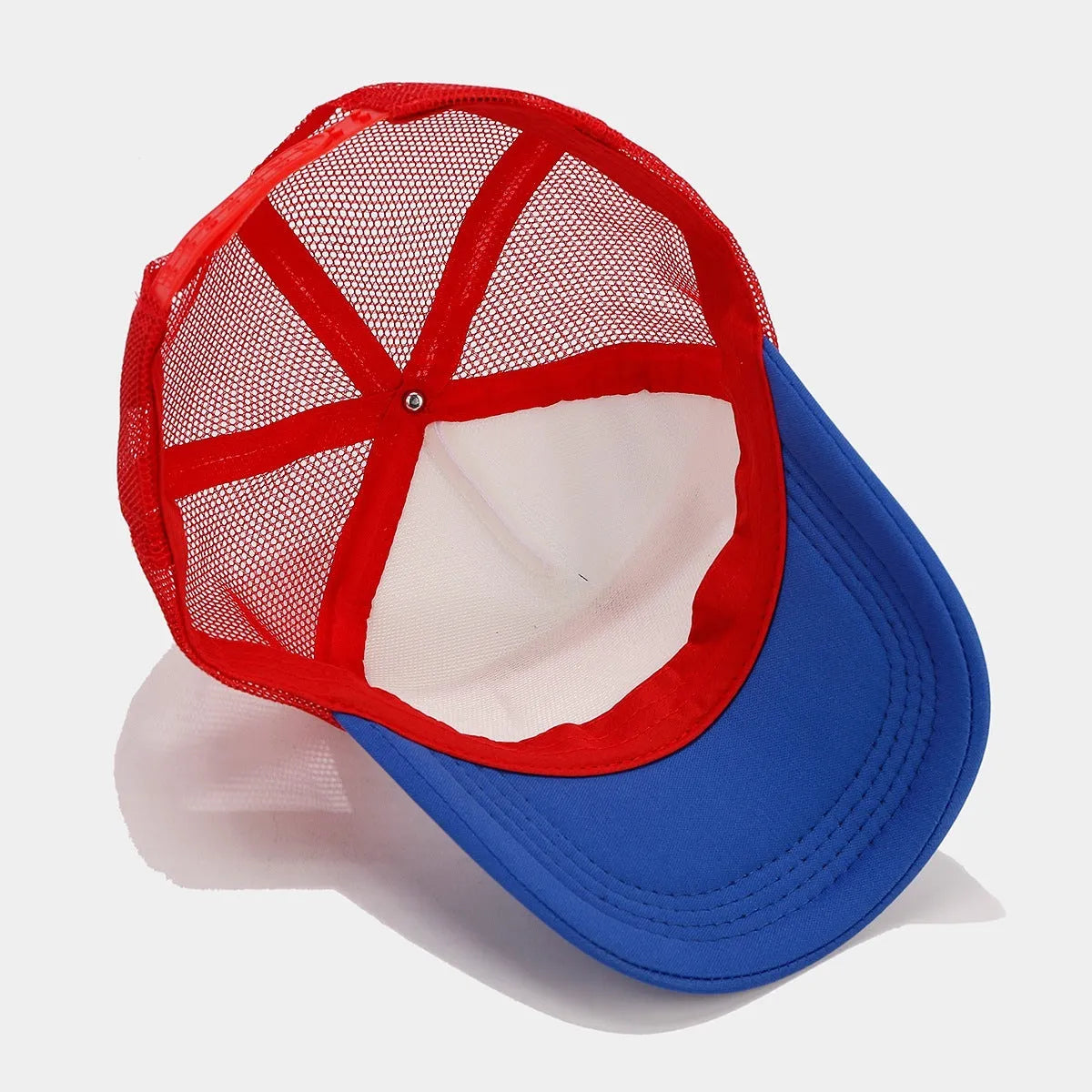 Red and blue mesh cotton baseball cap with adjustable strap and dome crown design