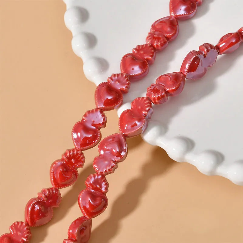 Ceramic love heart small torch shaped beads in various colours with straight holes for jewellery making