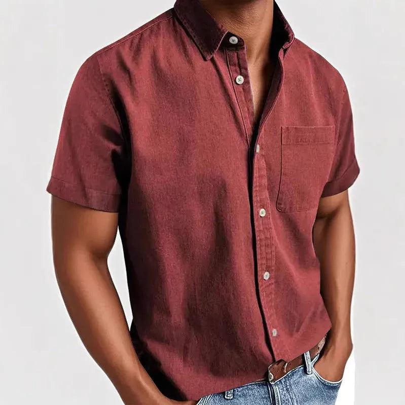 Men's solid colour short-sleeve shirt with a polo collar and a single chest pocket.