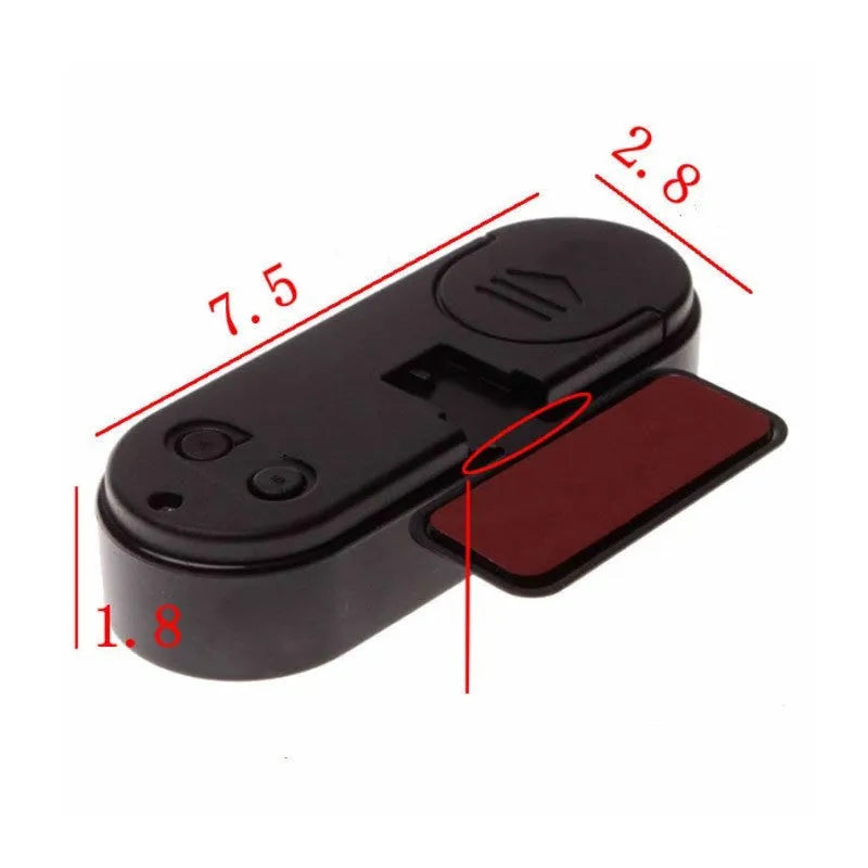 Black digital car dashboard clock and thermometer with LED display on an adjustable mounting bracket.
