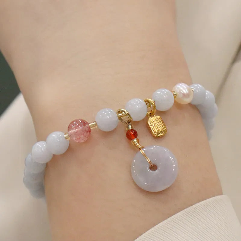 Aquamarine crystal bracelet with gold-plated climbing cat charm for women