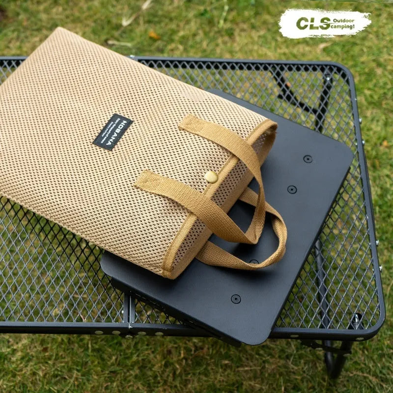 CLS Outdoor aluminium folding dual-use table and stool shown in heightened position as a small table.