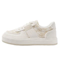 Beige plaid platform leisure sports shoes with white rubber sole and front lace-up fastening.
