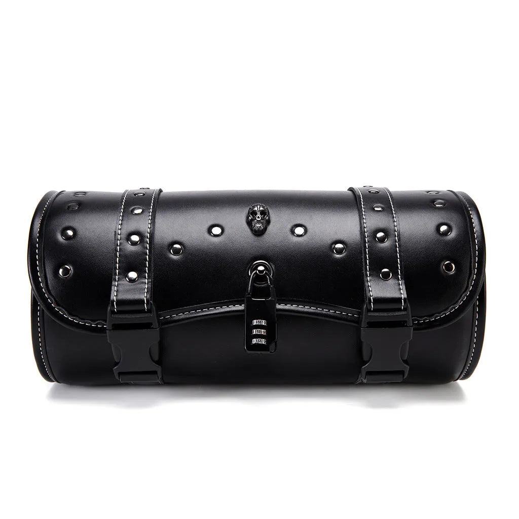 Black punk-style motorcycle pannier bag made from PU leather mounted on a bike.
