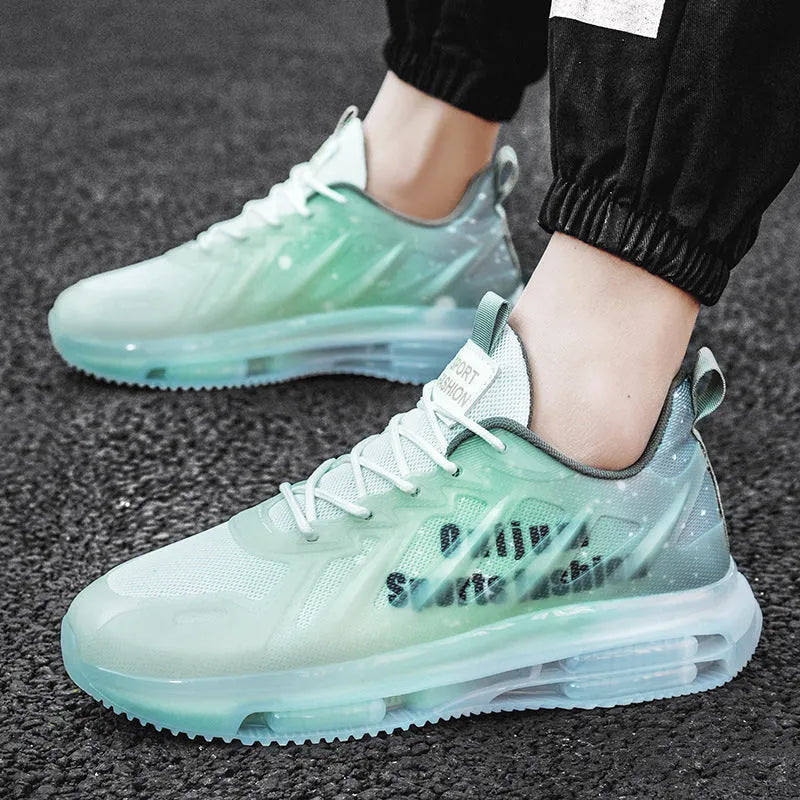Men's black and green colour-blocked platform running shoes with a mesh upper and rubber sole.