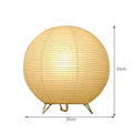 White traditional rice paper table lamp with E14 bulb holder on wooden desk