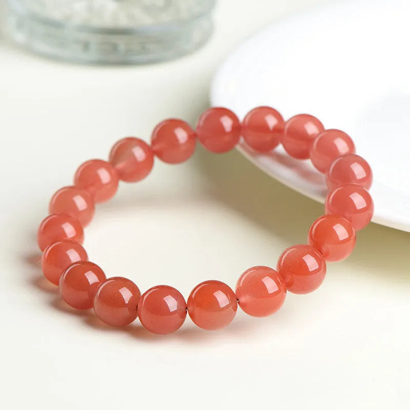 Natural south cherry red agate bracelet showing single and triple strand design options with different bead sizes.