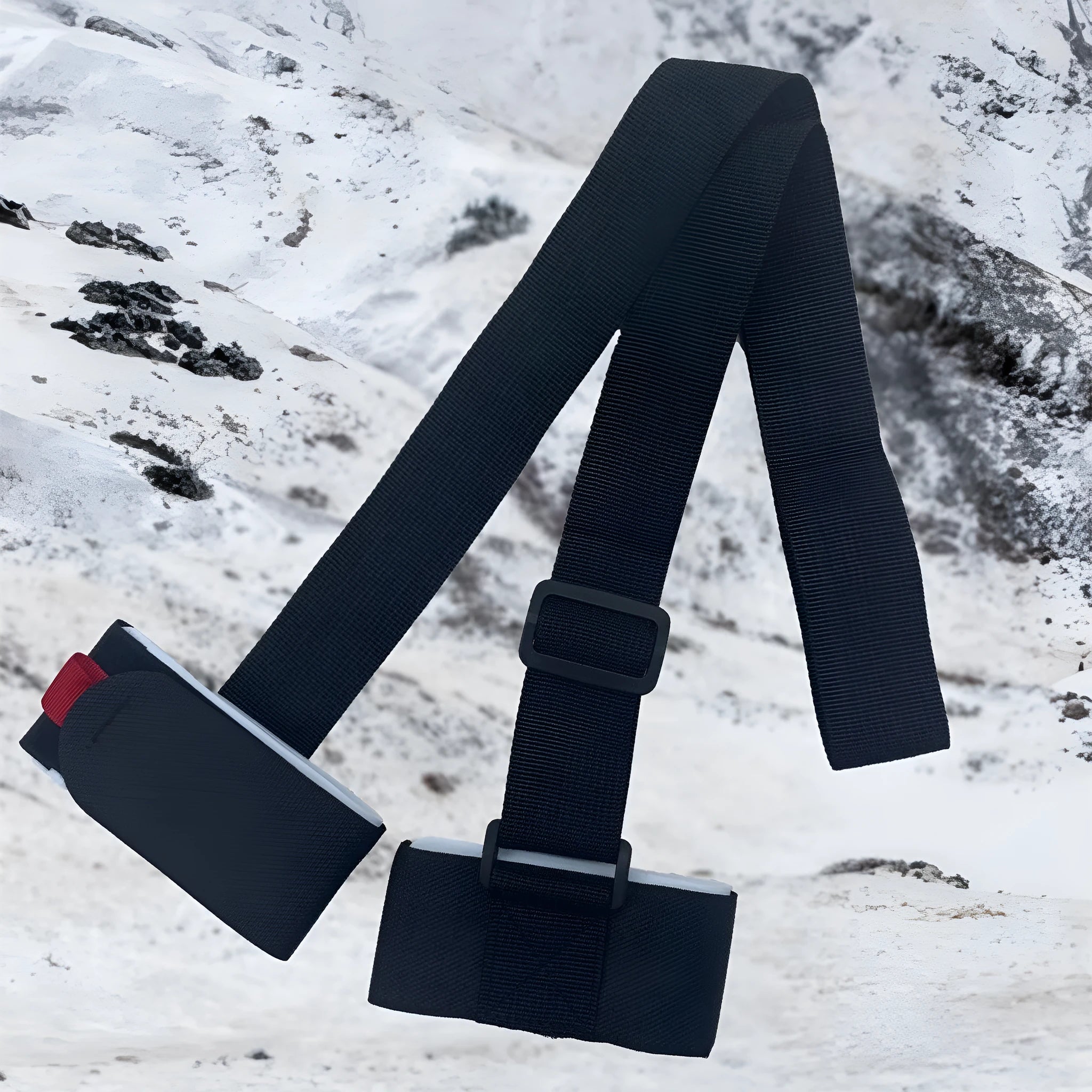 Adjustable black skiing bandage shoulder strap with hook and loop fastening for sled carrying.