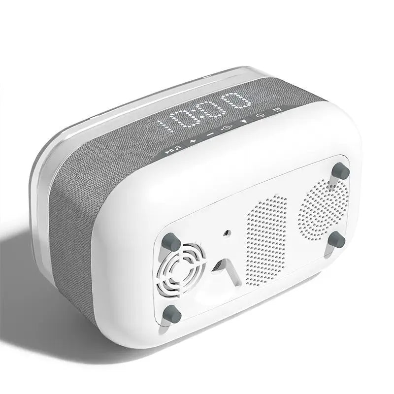 White alarm clock with wireless charging surface and Bluetooth speaker functionality for bedside use