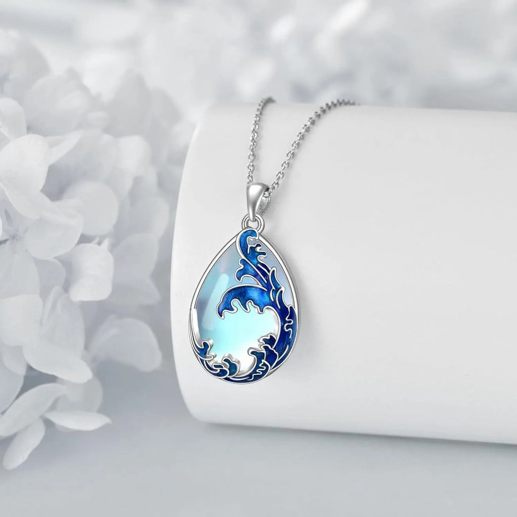 Moonstone blue heart-shaped alloy pendant necklace on a silver-plated chain for women.