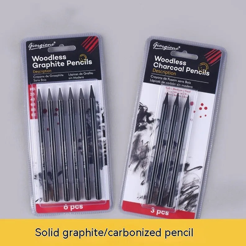 Set of graphite and carbonized wooden pencils on a suction card packaging.