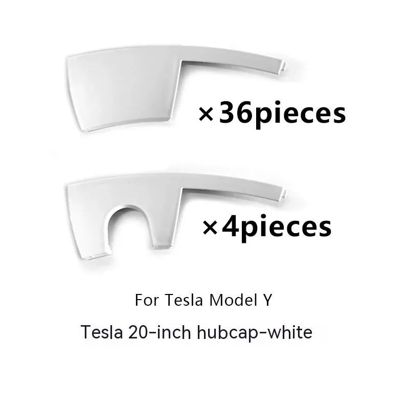 Set of four plastic Tesla Model Y wheel hub covers in black, white, red, and carbon fibre pattern.