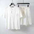Men's loose fit linen two-piece set with short sleeve top and matching shorts