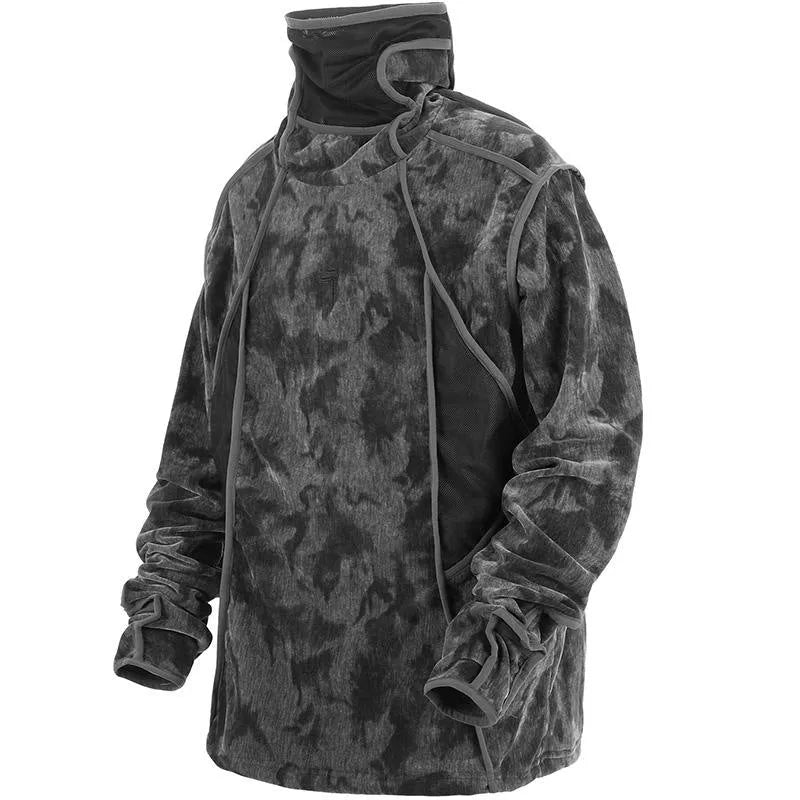 Man wearing a black tie dye print loose pullover sweater with drop-shoulder sleeves.