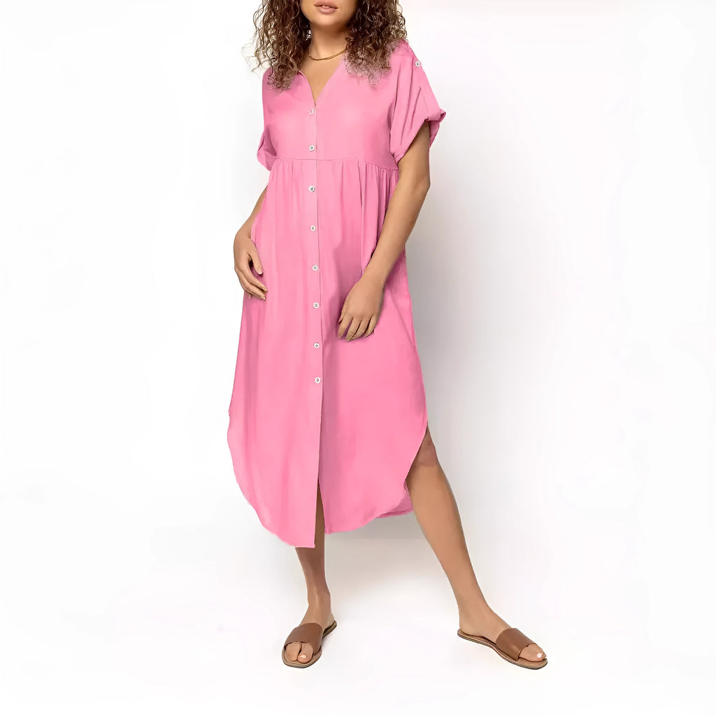 Loose fit solid colour midi dress with decorative buttons on a hanger