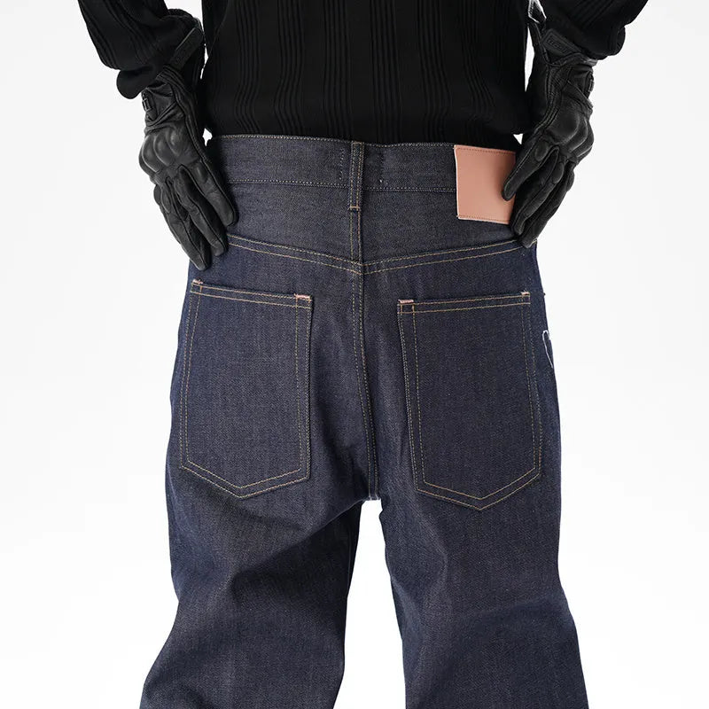 Men's dark blue loose straight leg jeans with original cattle wash on denim fabric