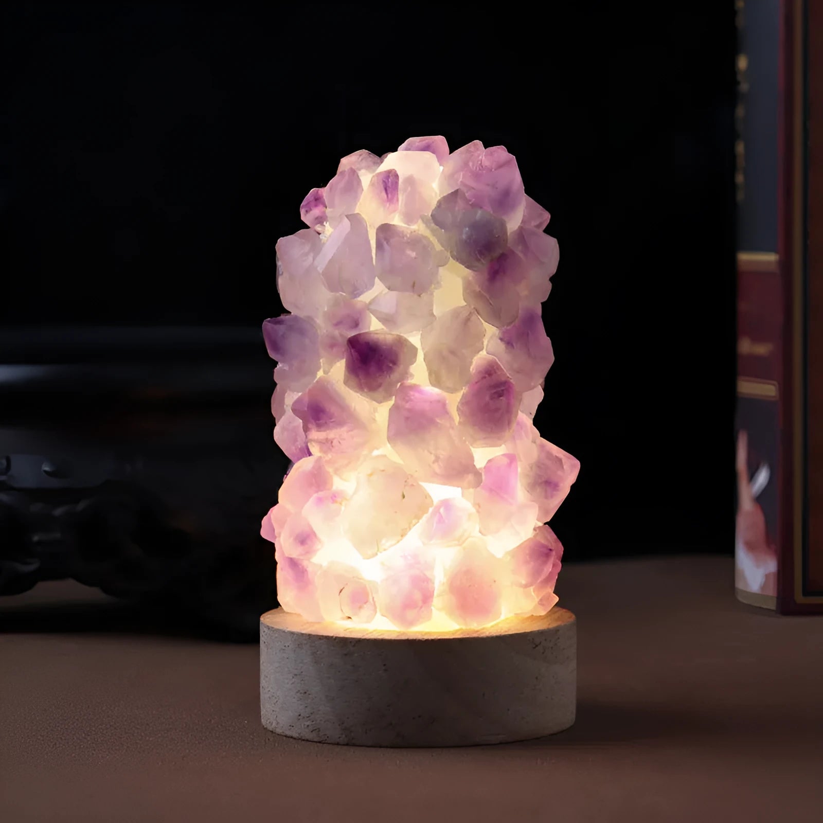 Natural amethyst crystal night light with USB plug showing both warm and cold light settings