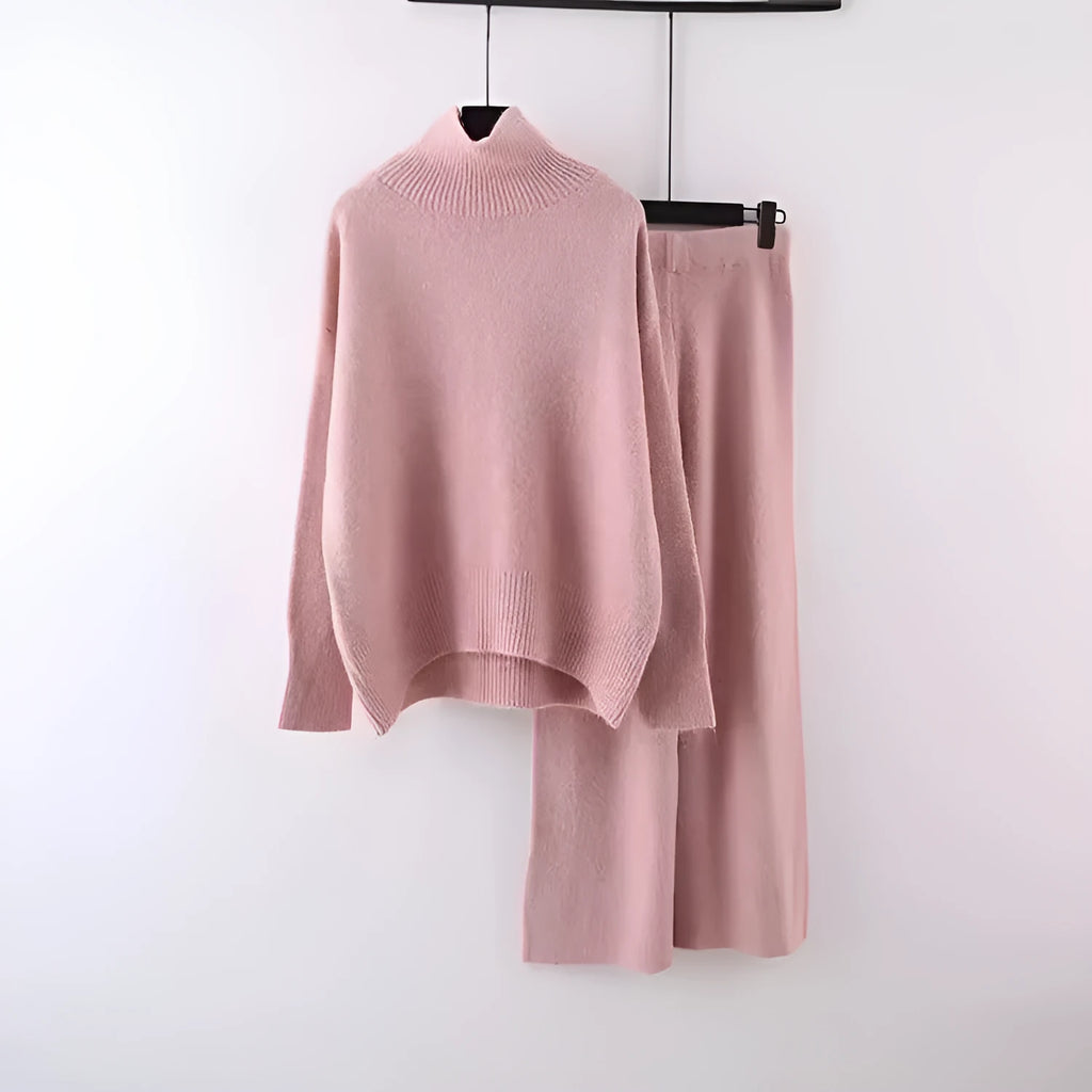 Women's beige acrylic fibre sweater and wide-leg trousers two-piece set on a hanger.