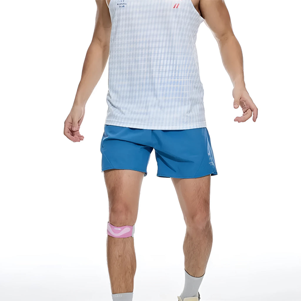 Black and blue four-point stretch running shorts with laser-punched seams on a mannequin.
