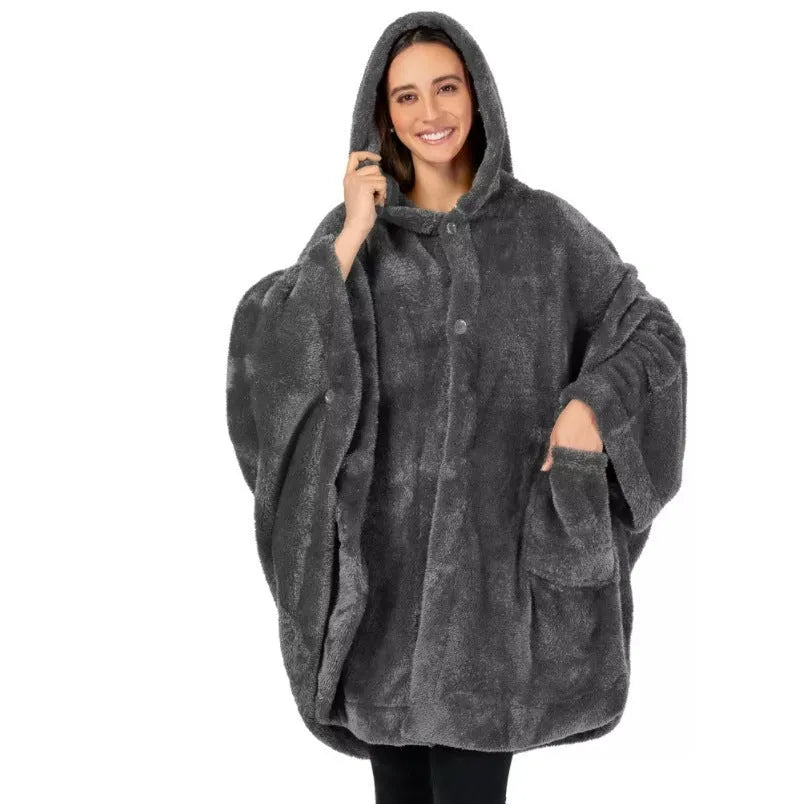 A thick, hooded, long-sleeve bathrobe in a solid colour, shown on a hanger.