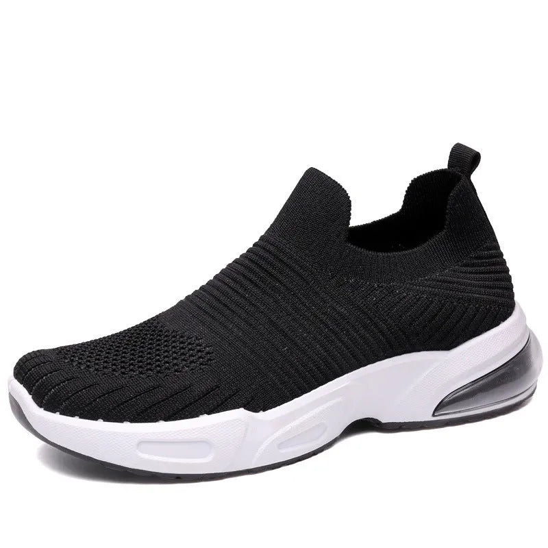 Slip-on breathable sock shoes in black, pink, khaki, and white colours on a white background.