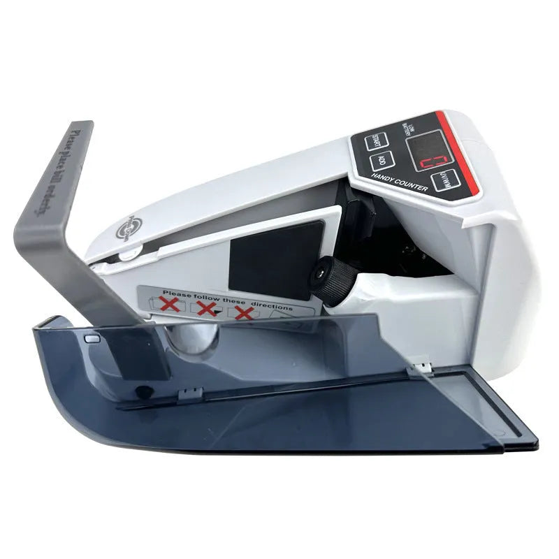V31 foreign currency counting machine with purple light banknote verification and LED display on desk