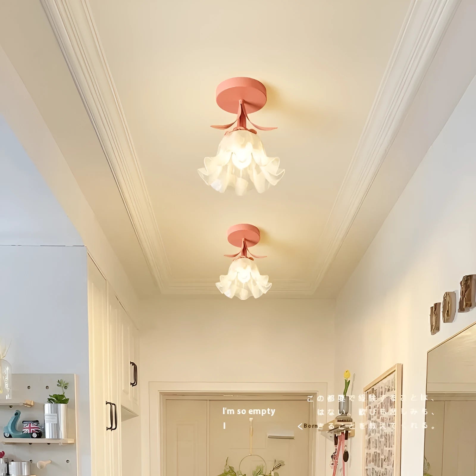 Cream coloured Linglan flower modern corridor wall light fixture on display.