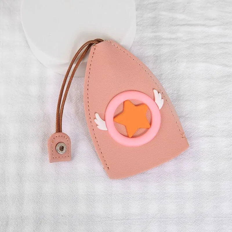 Cartoon pull-out key case in PU leather measuring 14 x 7.5 cm with colourful designs
