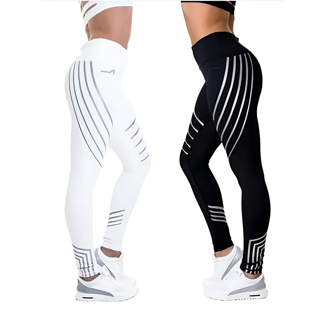 Women's black high-waisted workout leggings with night glowing print pattern on legs