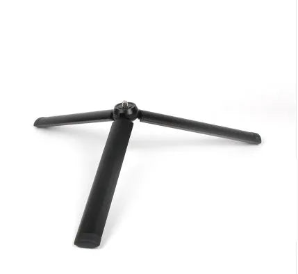 Black aluminium mobile phone tripod and handheld stabiliser accessory compatible with Apple iPhone smartphones