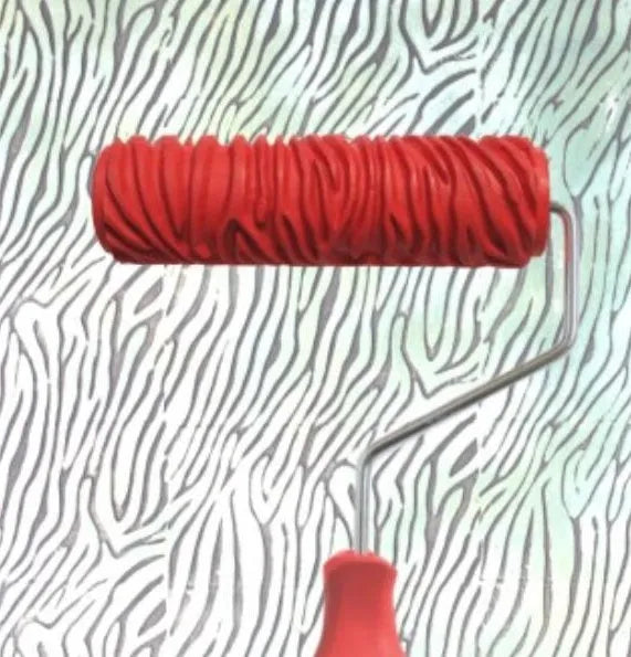 Red 7-inch rubber embossing paint roller for creating textured wall patterns.