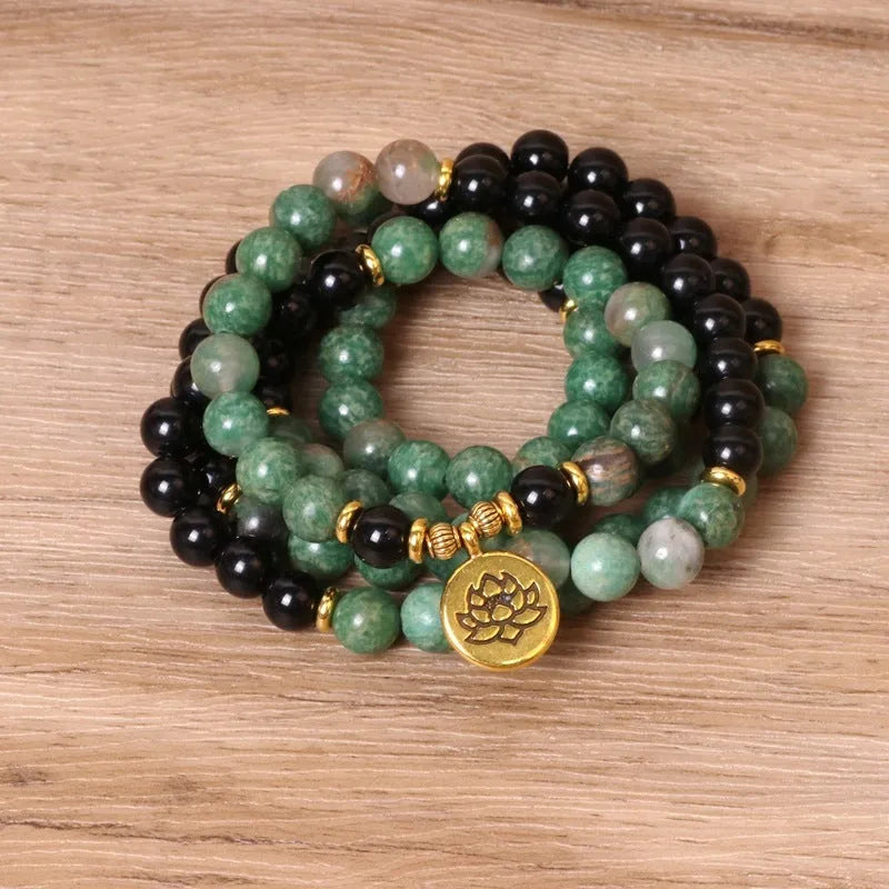 Green and black elastic beaded long bracelet with alloy beads on stretch cord
